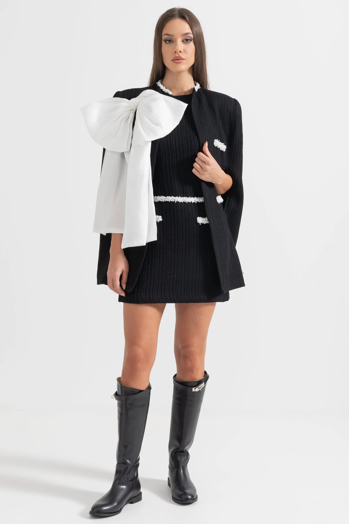 Elegant Textured Overcoat With White Bow Detail - Black