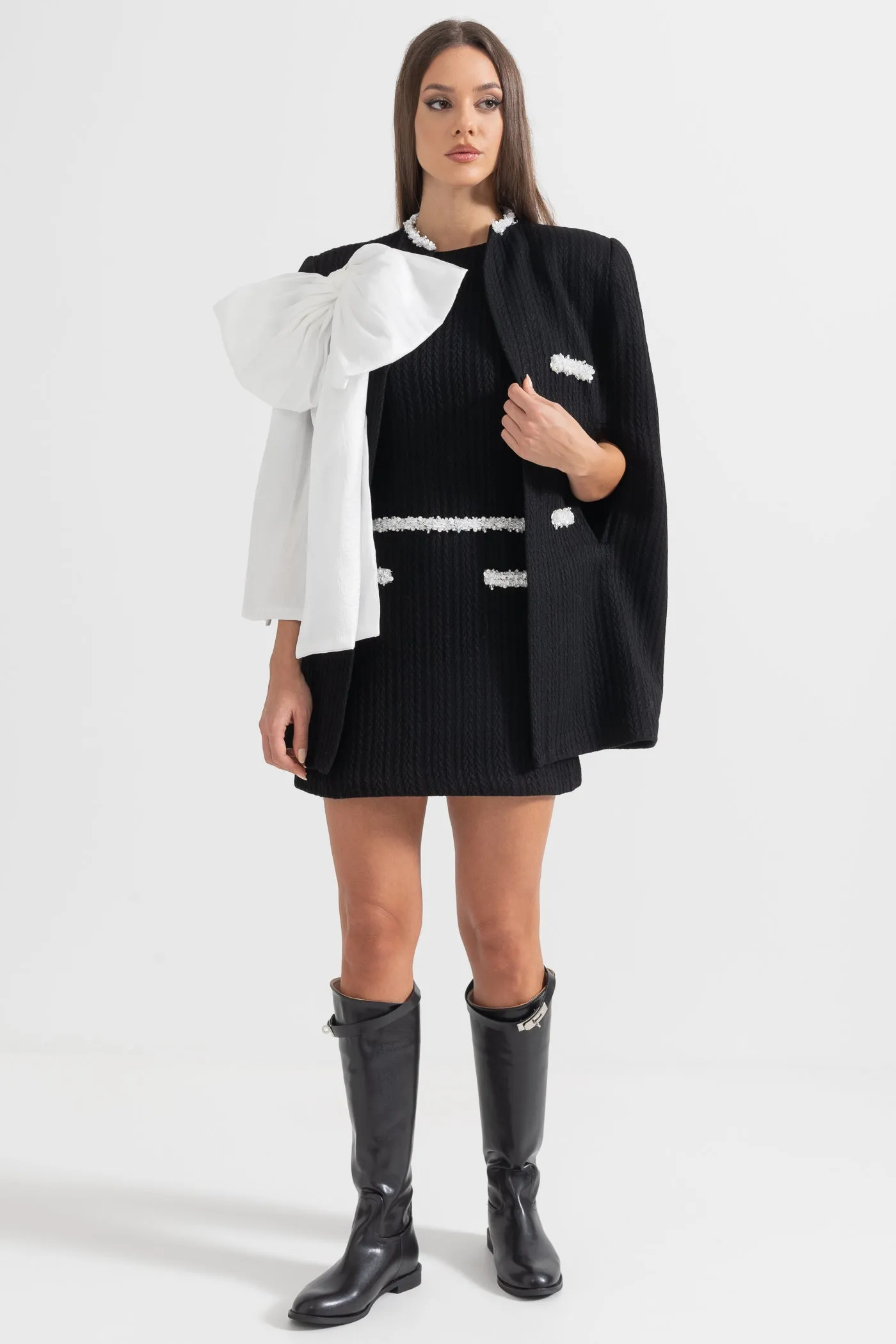 Elegant Textured Overcoat With White Bow Detail - Black