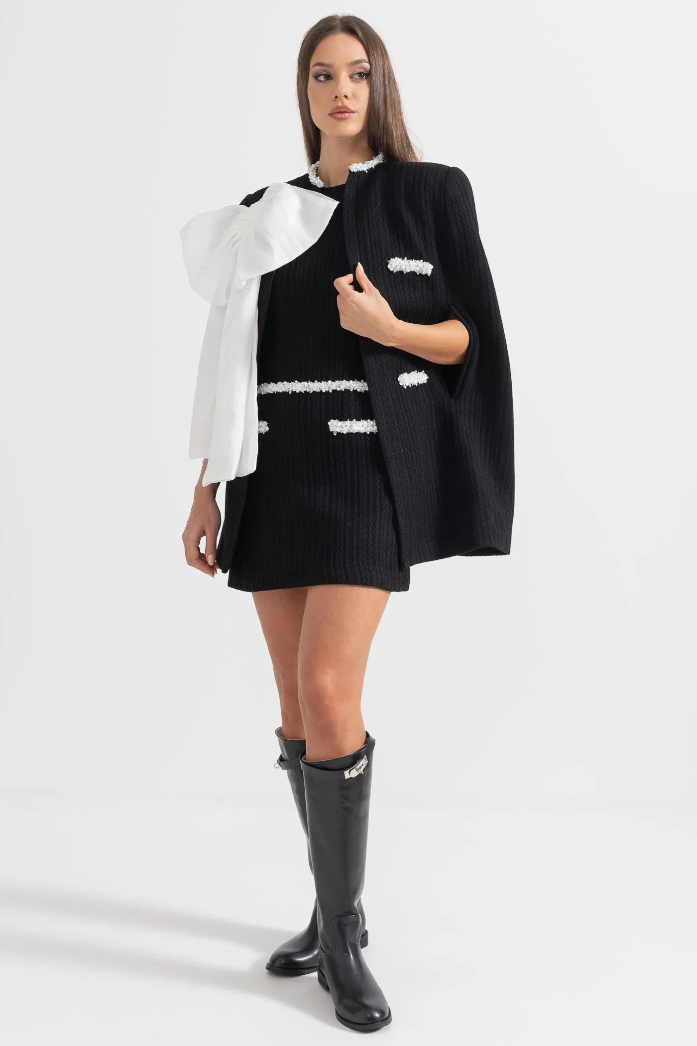 Elegant Textured Overcoat With White Bow Detail - Black